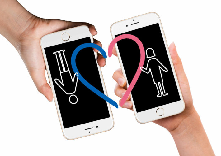 スマホを使ってマッチングする男女